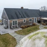 wide-angle view of a Martha's Vineyard coastal property in early spring