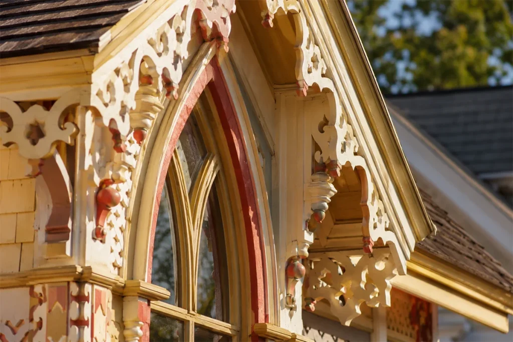 Carpenter gothic gingerbread cottage painted fretwork trim Oak Bluffs MVCMA campground